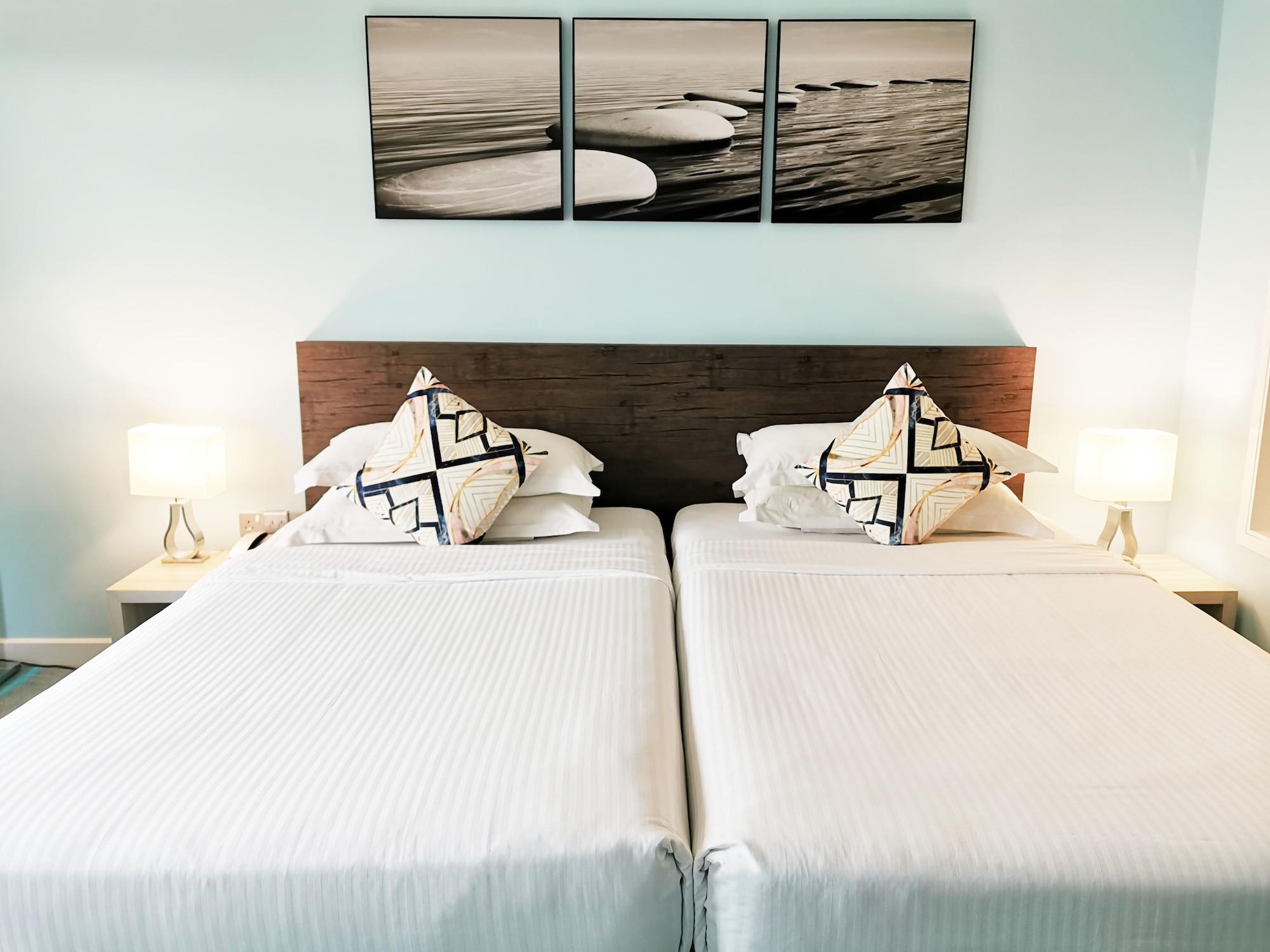 Thistle Johor Bahru Eksteriør bilde A bedroom at the hotel
